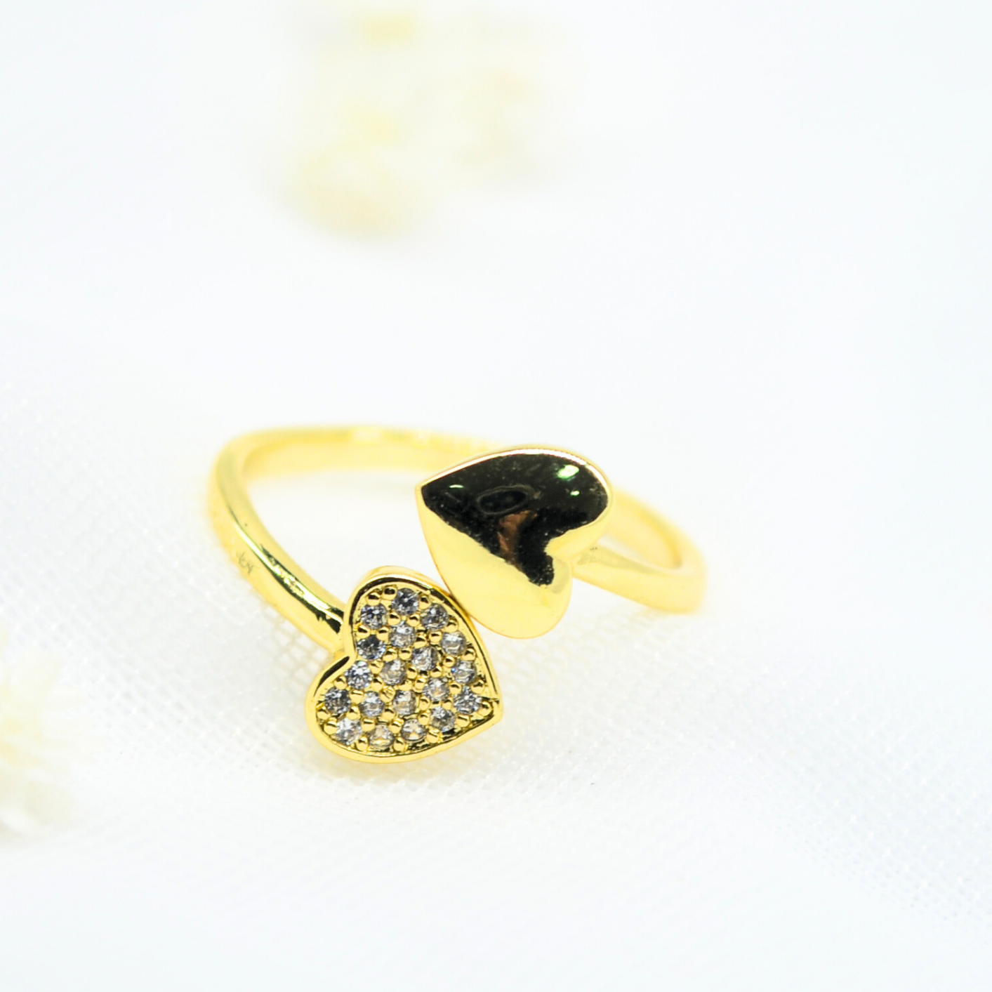 anillo dúo de corazones
