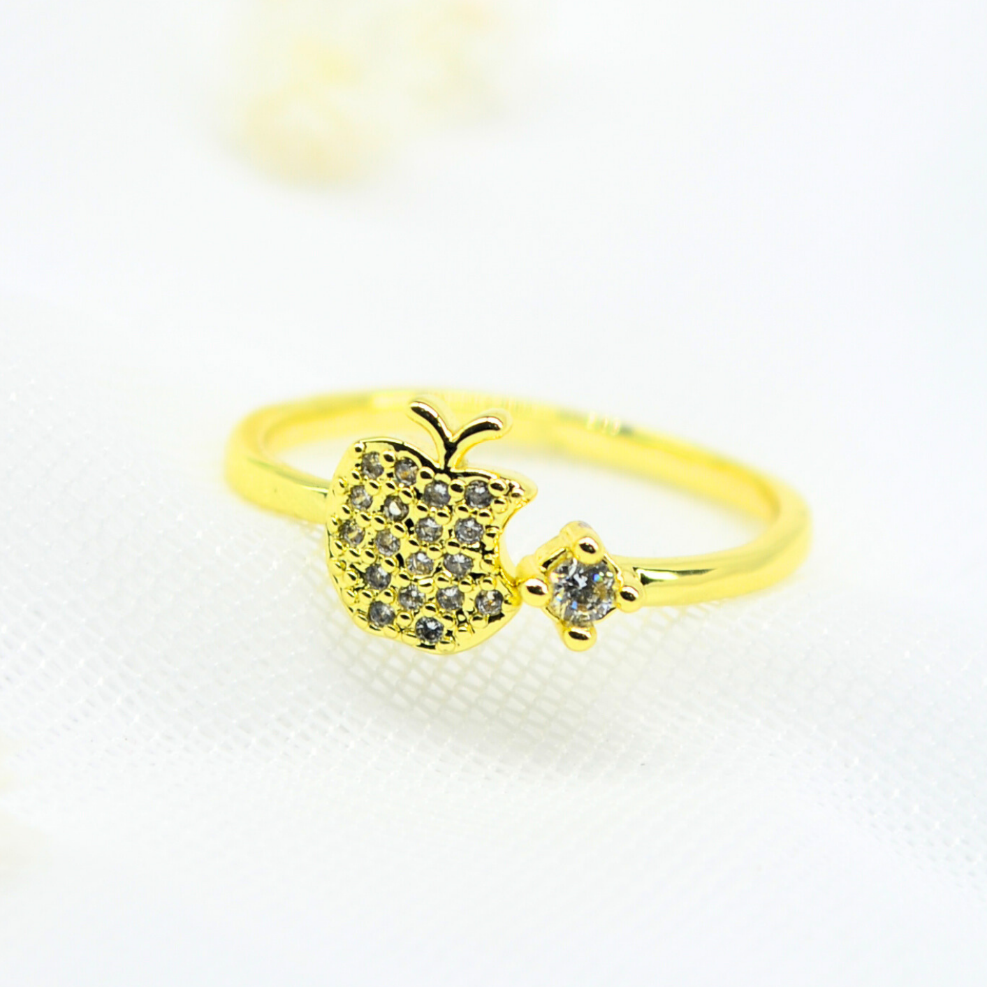 anillo manzana radiante