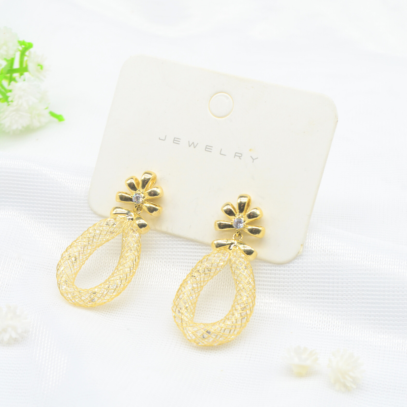 aretes gota de florecer