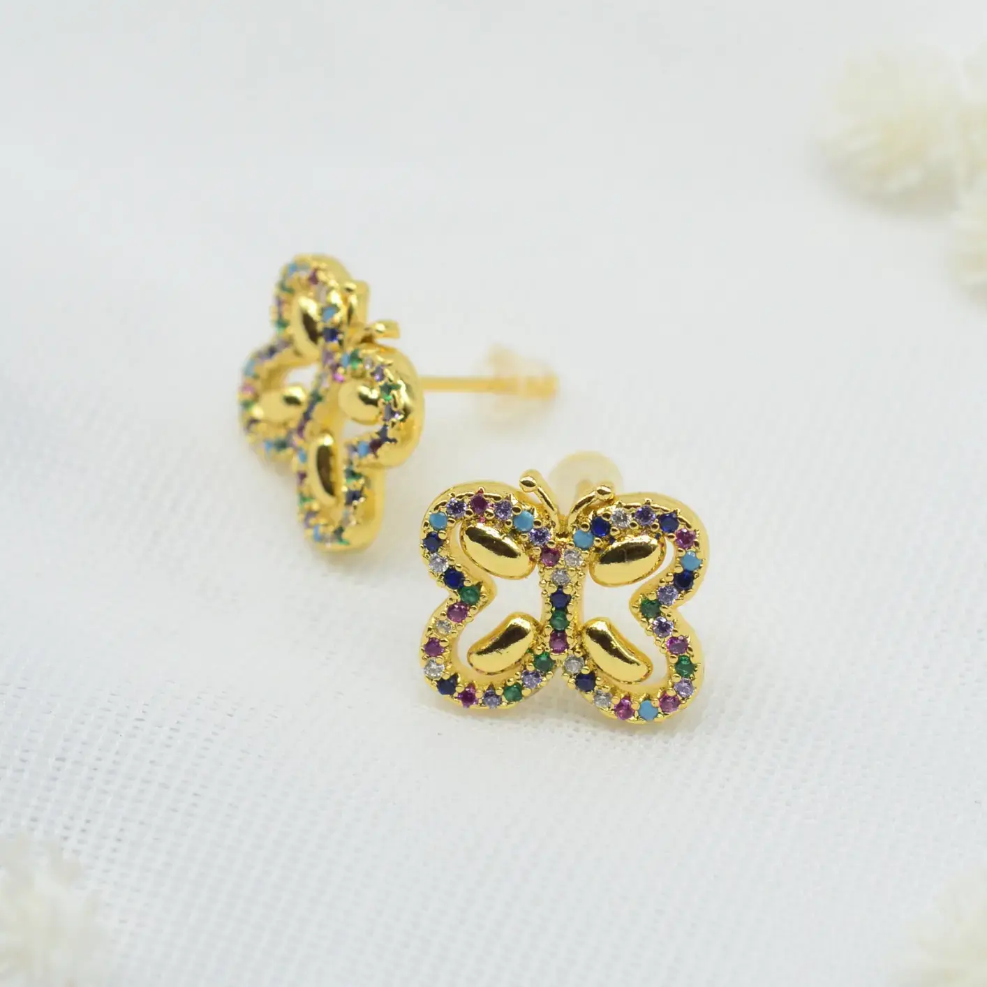 topos de mariposa con circones multicolor