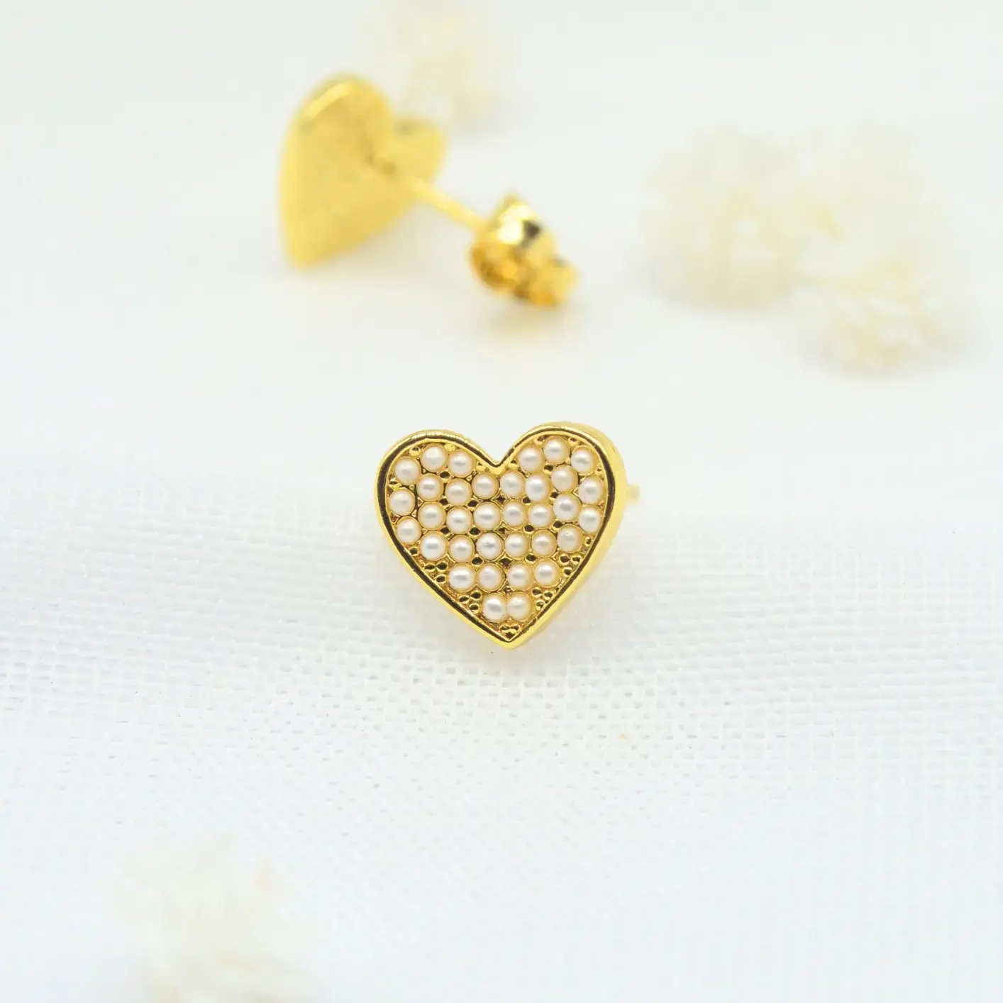 topos de corazón con microperlas.